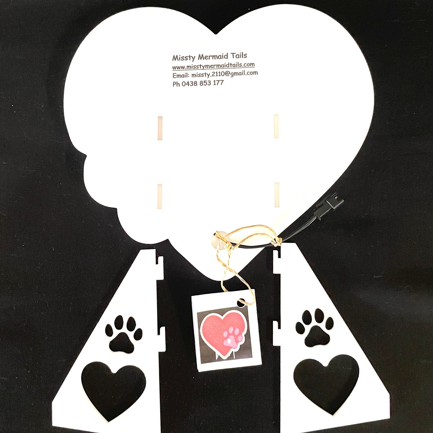 back view of heart with paw print neon light showing how the stands attach
