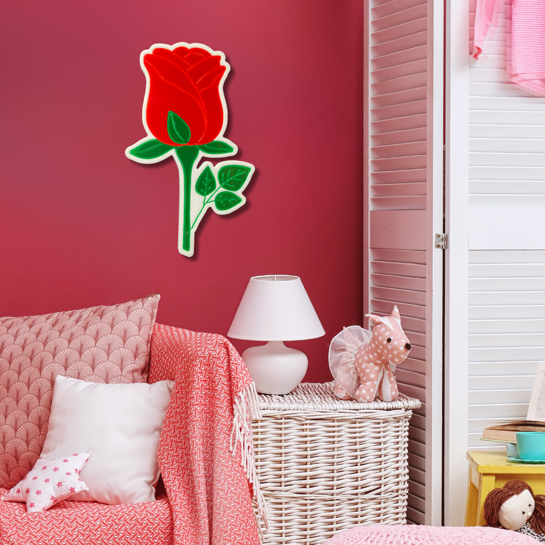 Red rose neon light mounted on the wall