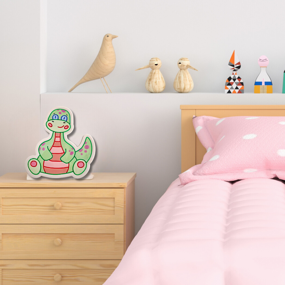 Baby dinosaur neon light on bedside table