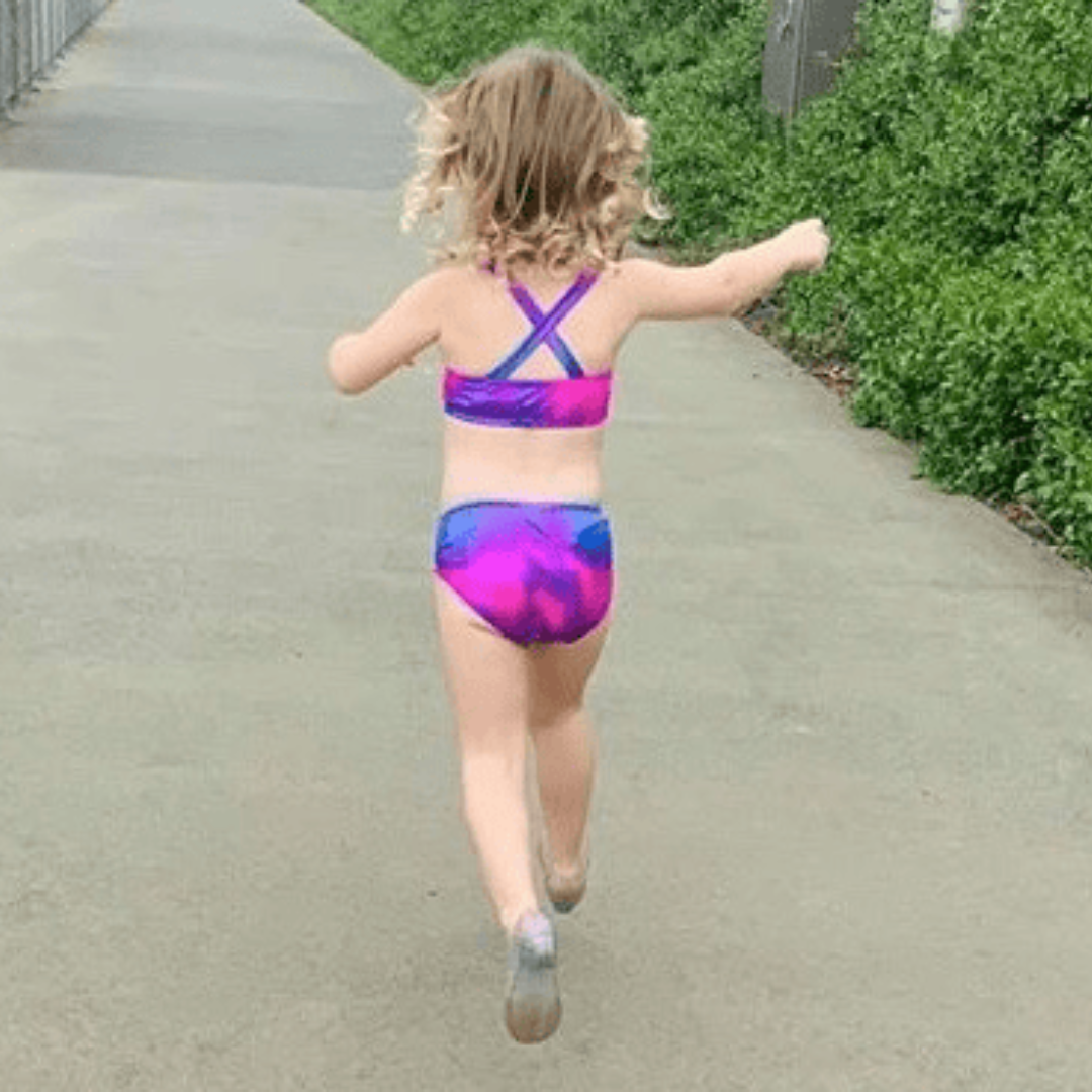Back view of girl wearing tie-dye bikini Brisbane Australia