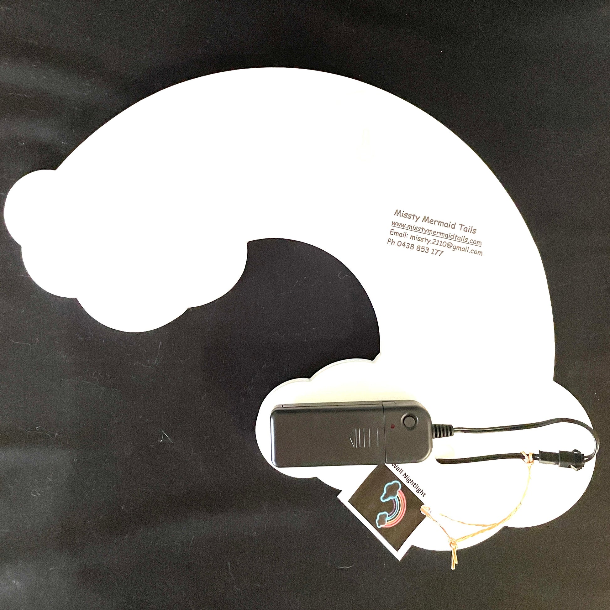 Back view of rainbow neon light with a battery pack