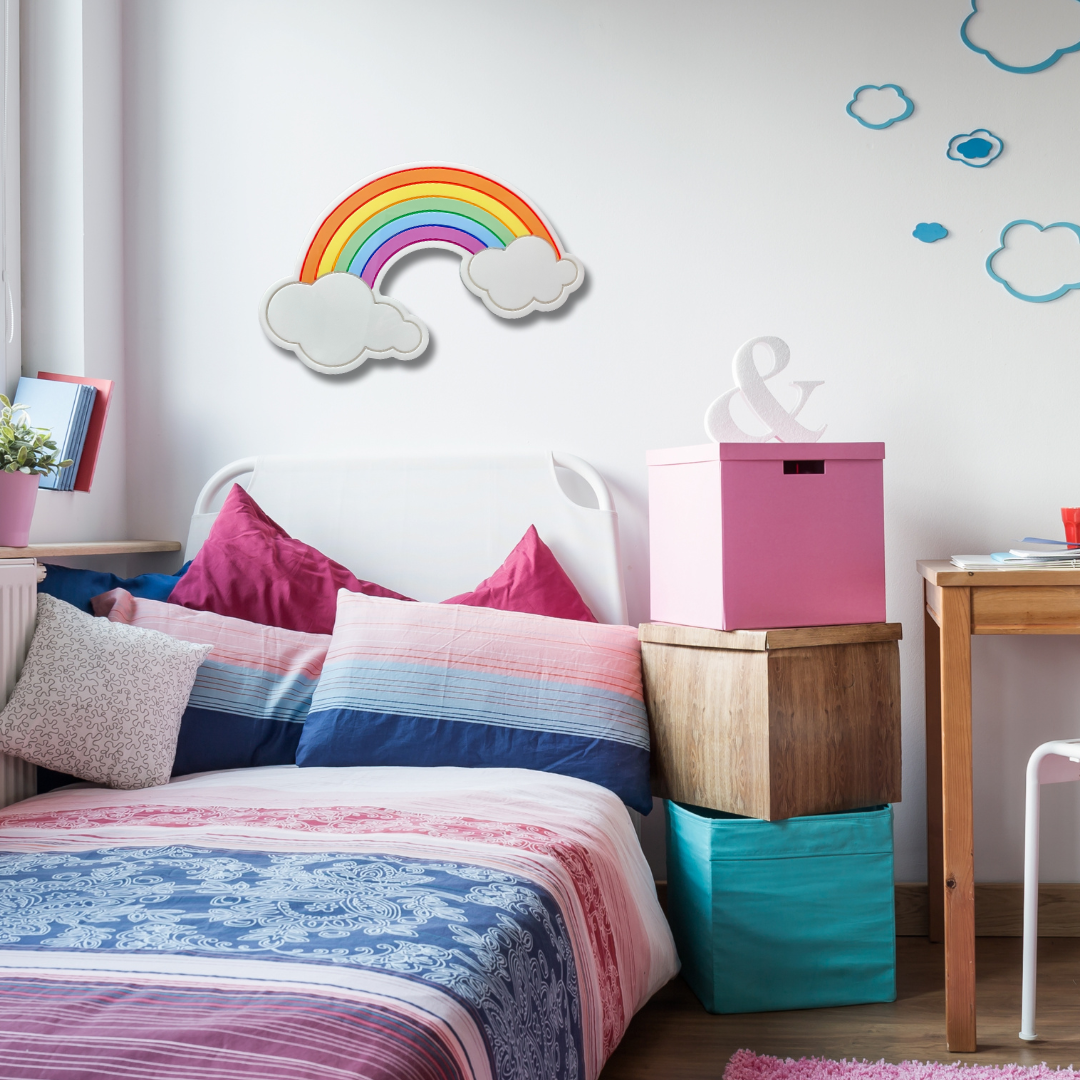 Rainbow and clouds neon light mounted on the wall