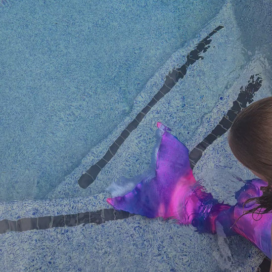 Girl swimming in a swimmable mermaid tail Brisbane Australia