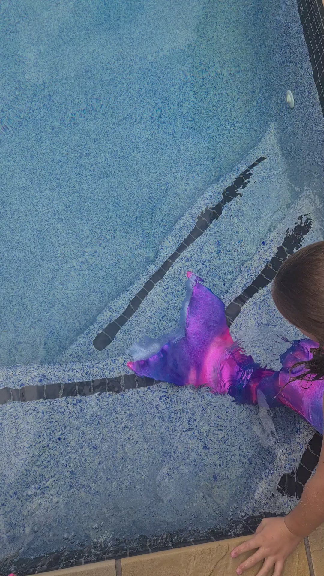 Girl swimming in a swimmable mermaid tail Brisbane Australia
